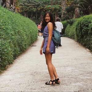 Blue Romper with belt.